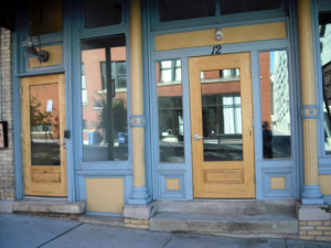 The same urban storefronts, 1981 and 2010.